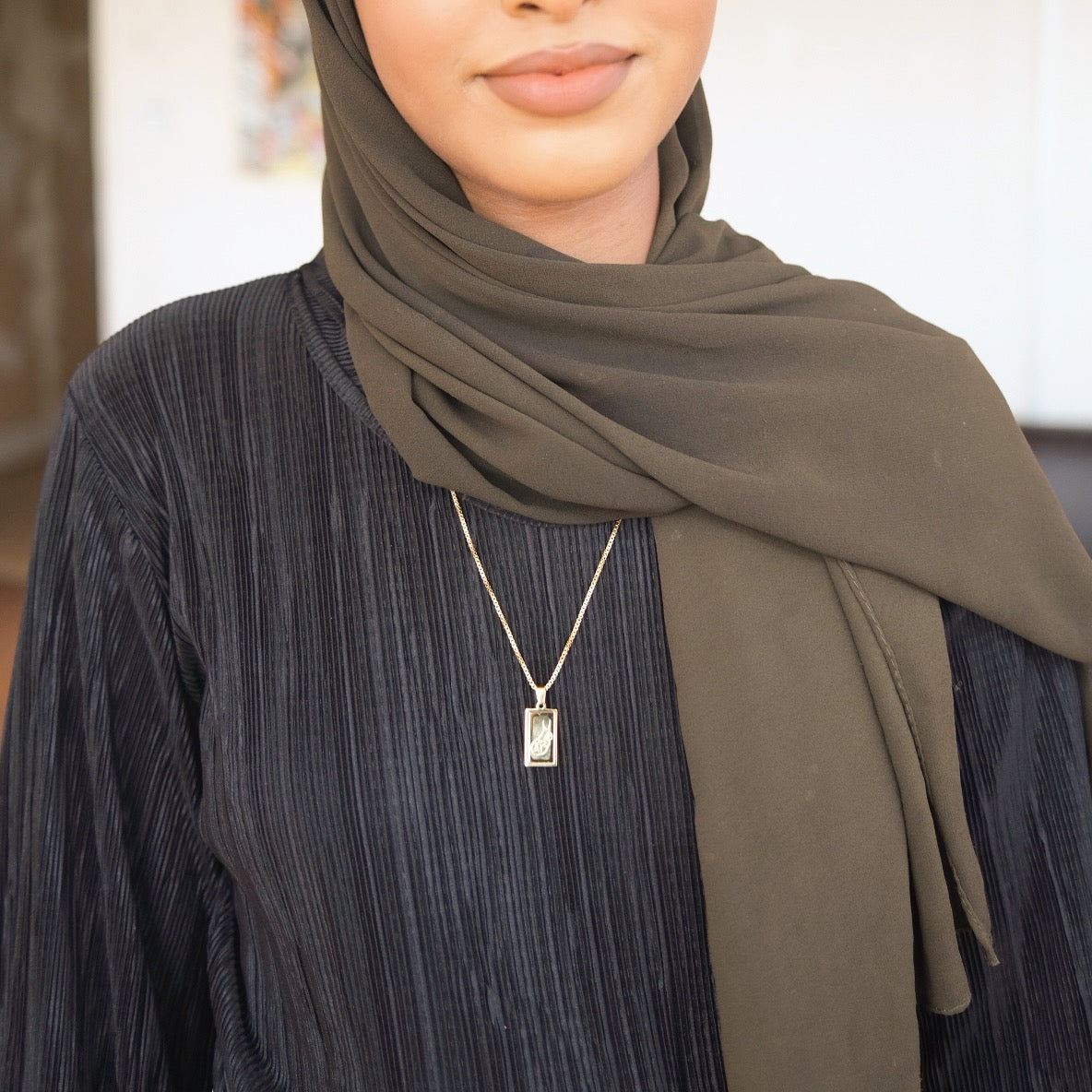 Nimah Tawakkul Arabic Necklace Worn By Woman Wearing a Hijab & Abaya