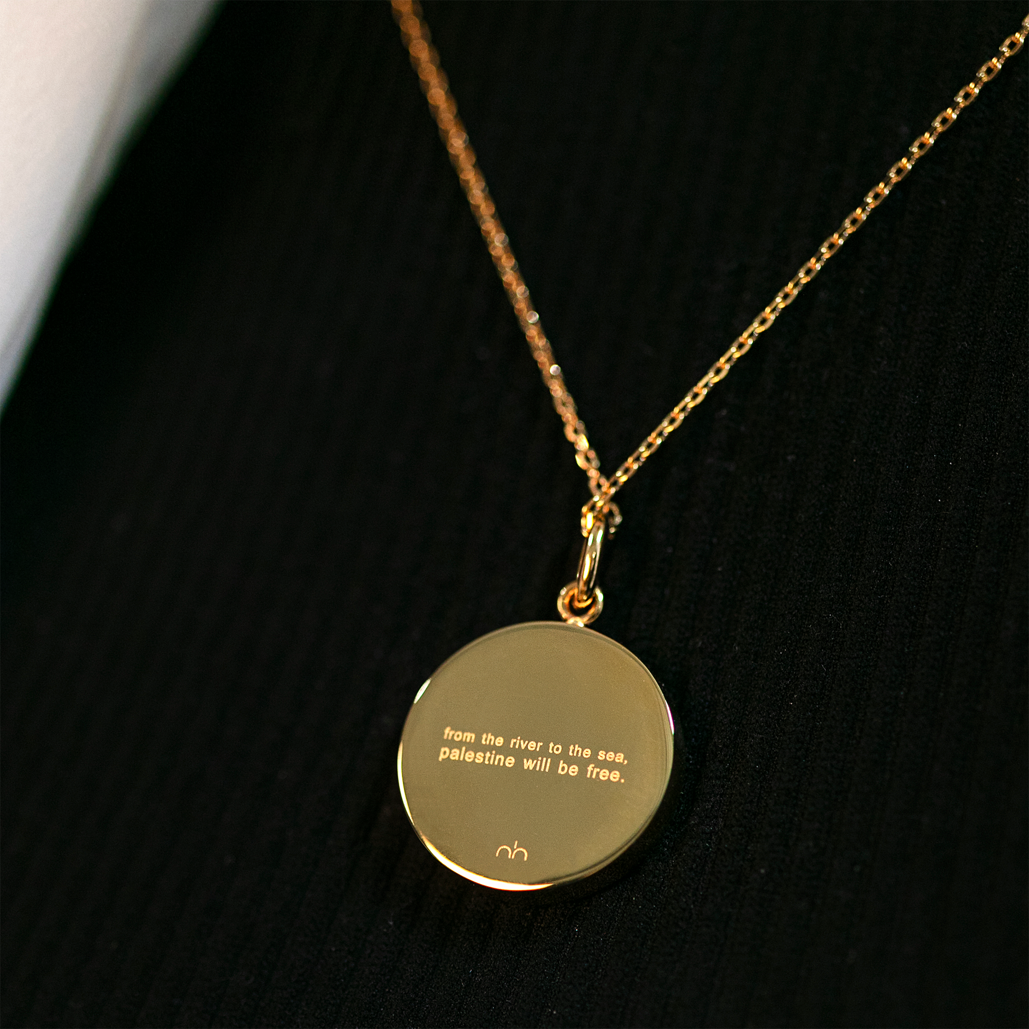 image showing the text on the back of the dome of the rock necklace