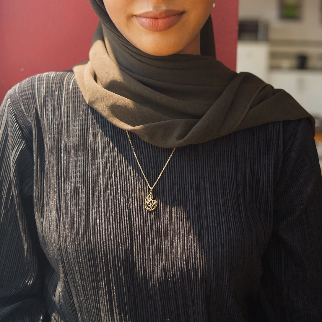 Model wearing Alhamdulillah Necklace, a stunning Islamic necklace celebrating thankfulness