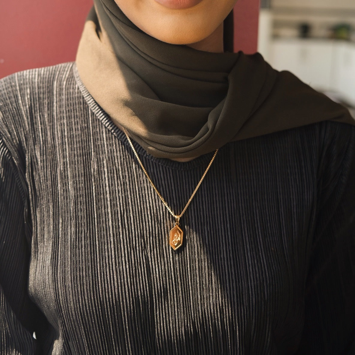 Nimah "Faith" Arabic Necklace Wiith 18K Gold Plating Worn By Woman Wearing Hijab & Abaya