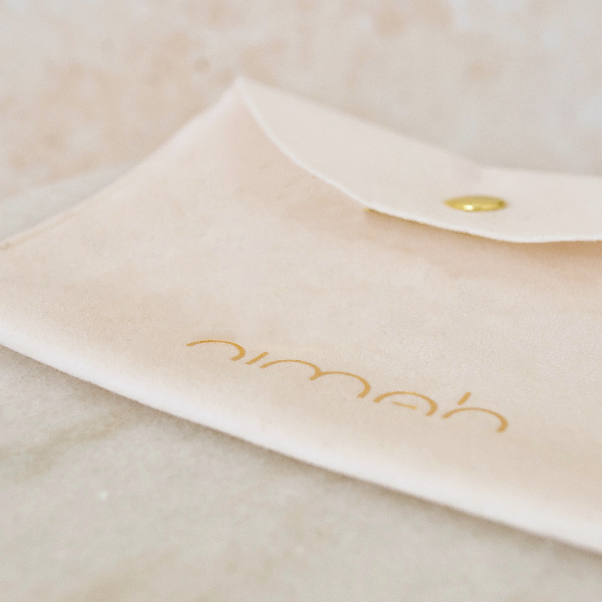 soft pouch that Nimah jewellery arrives in