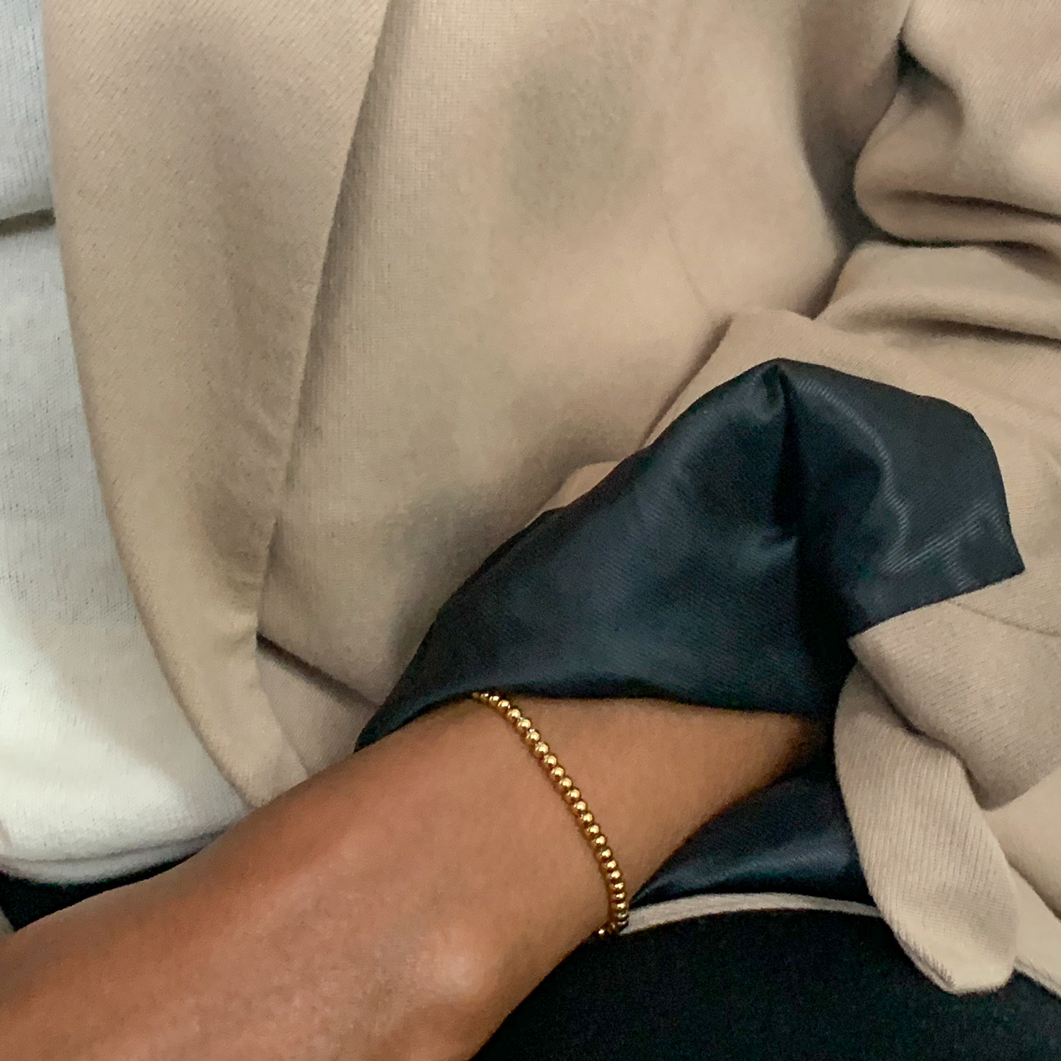 tasbih tasbeeh Arabic bracelet in gold worn by a model